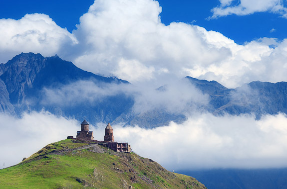 Where to travel in the High Caucasus Mountains - Kazbegi (Gergeti Trinity Church) DT 45511756
