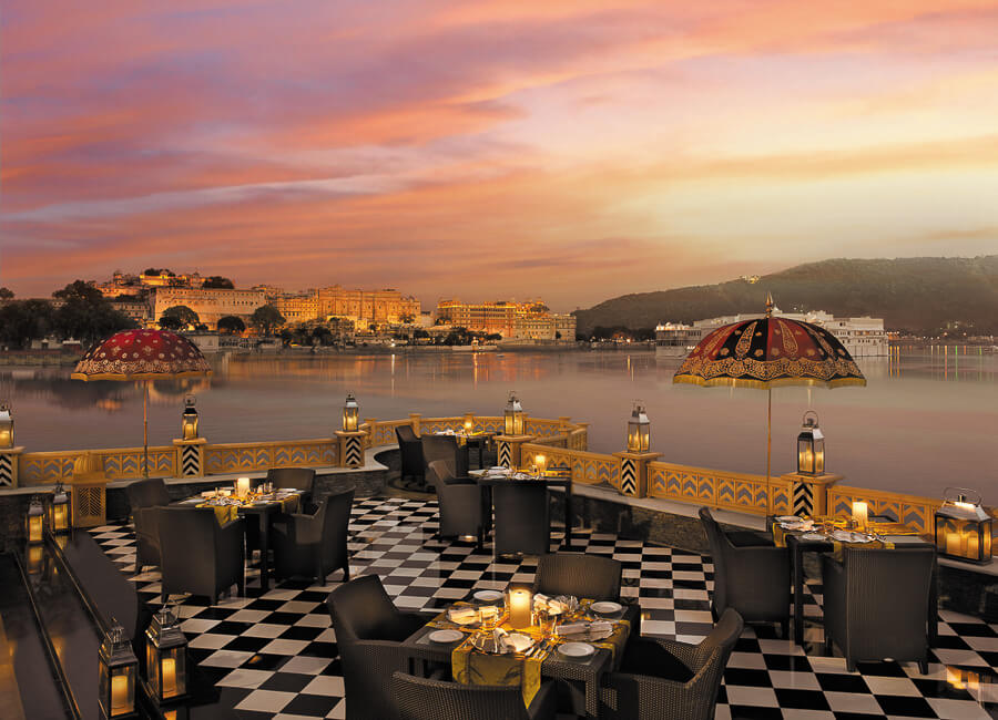 The Leela Palace Udaipur India (Sheesh Mahal view from terrace at dusk)