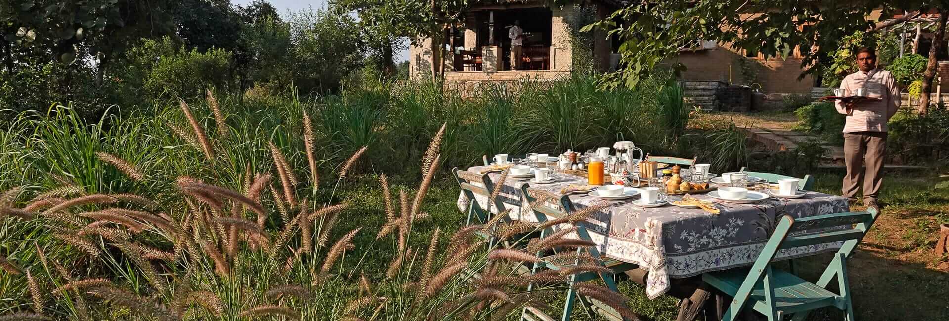 The Sarai at Toria Khajuraho India (Breakfast table in the garden)